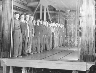 1939 - KONE freight elevator with workers